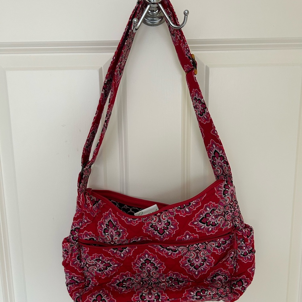 Red Vera Bradley shoulder bag with adjustable strap